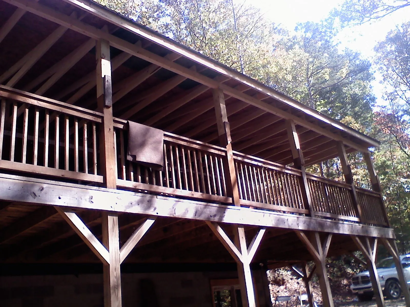 Timber framing under a new elevated porch and deck — Roof Leak Repair in Marshfield by Roofing Brothers